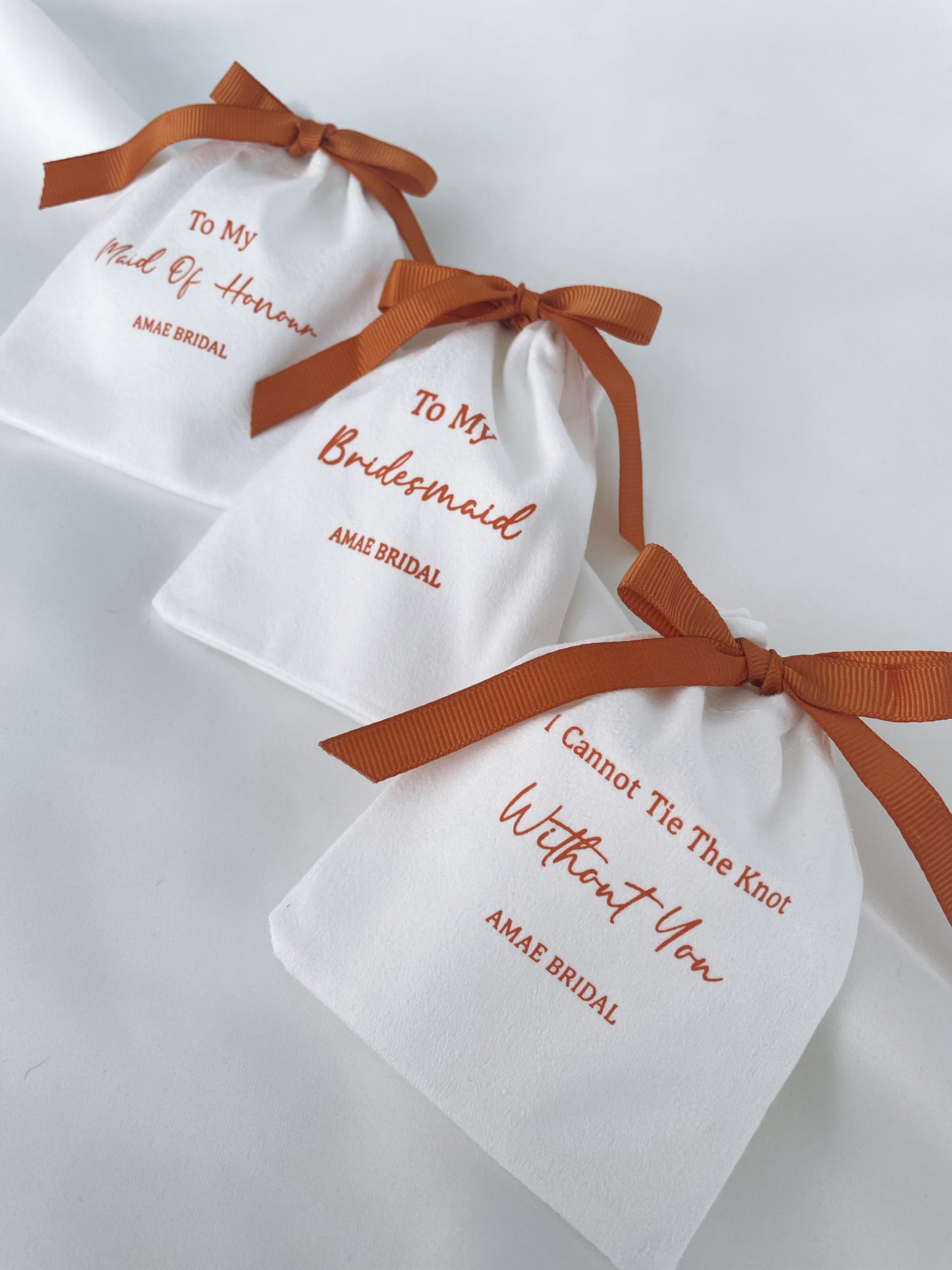 Rust Bow Bridal Party Pouches