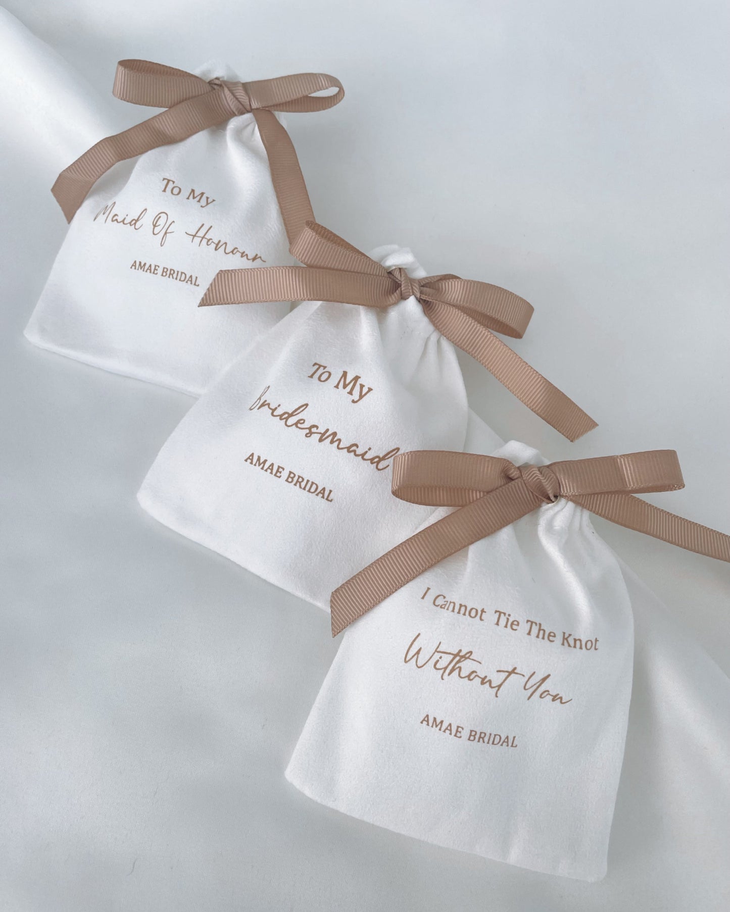 Beige Bow Bridal Party Pouches