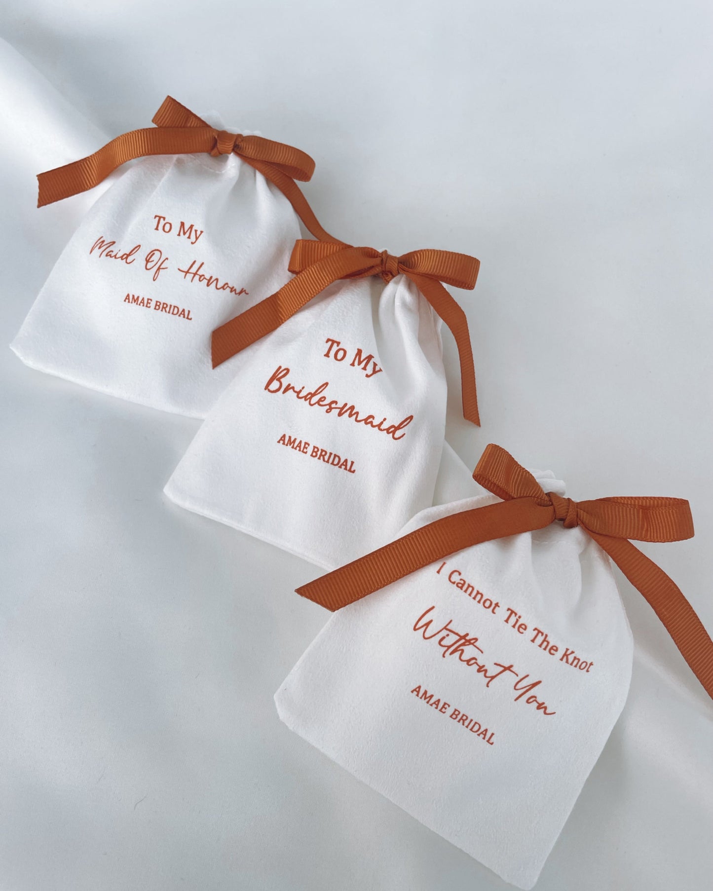 Rust Bow Bridal Party Pouches
