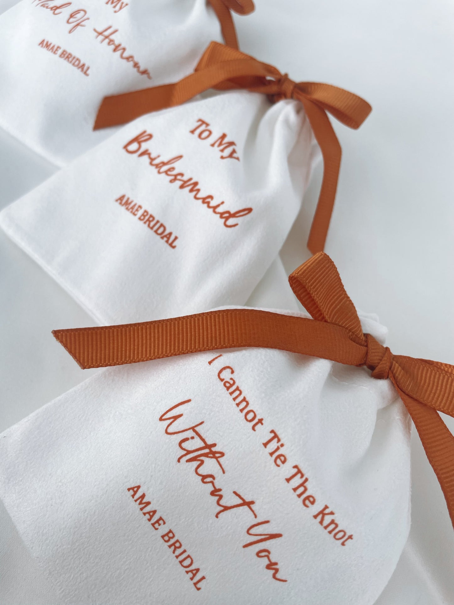 Rust Bow Bridal Party Pouches