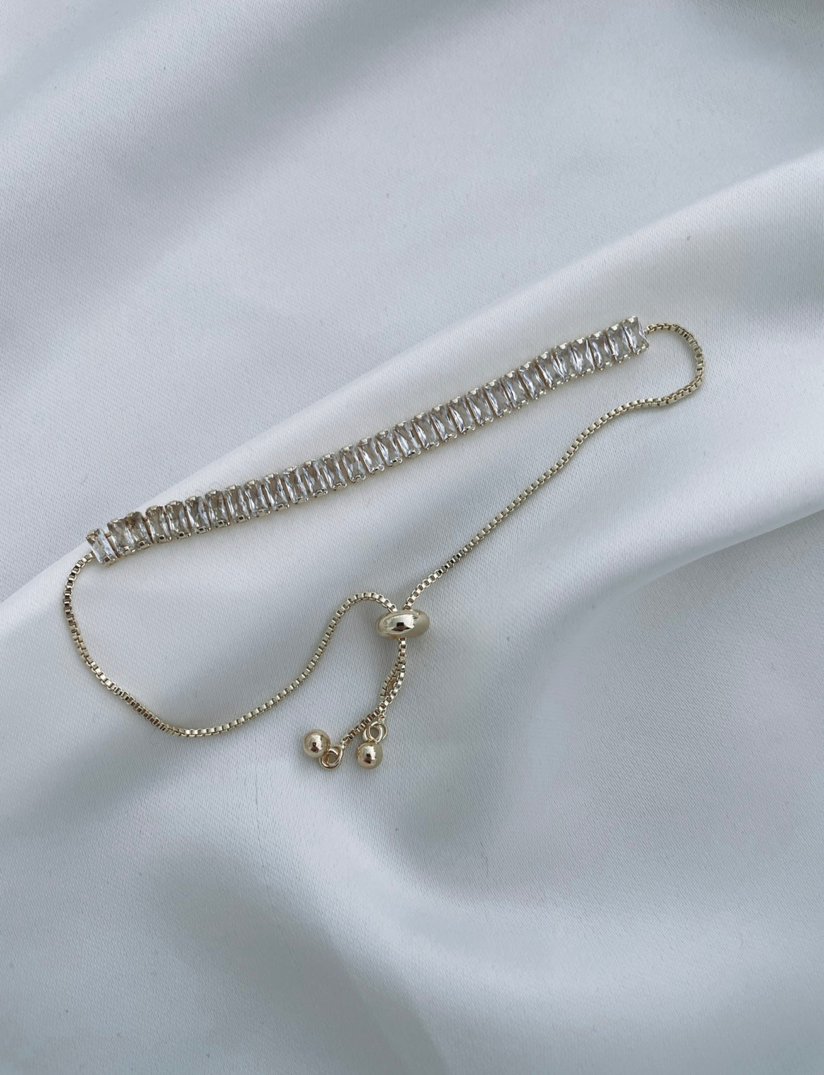 Gold baguette cut slider bracelet